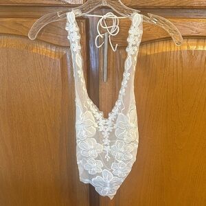 Elegant Lace Top with tie back in White. Size Small